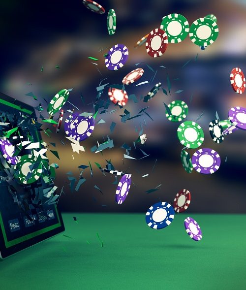tablet pc with a poker app and poker chips coming out by breaking the glass, concept of online gaming (3d render)
